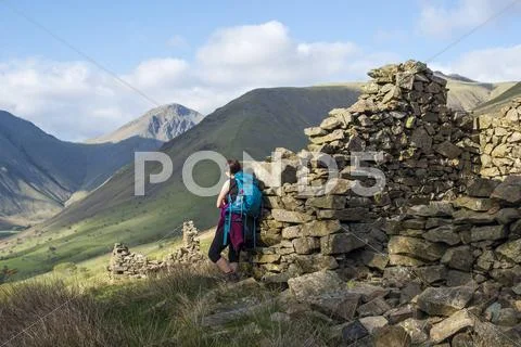 Crumbling stone houses in the English Lake District in Wast Water with views of Stock Photos