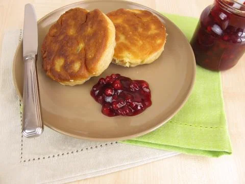 Crumpets with cranberries Stock Photos