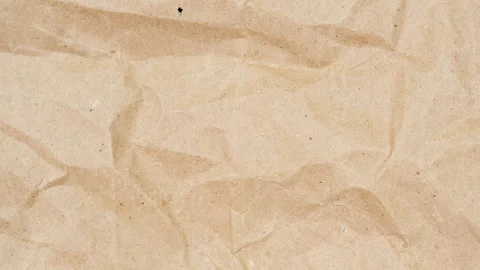 Crumpled Beige Paper Texture Forms a Seamless Loop, Creating a Minimal Clean Sur Stock Footage 340609350