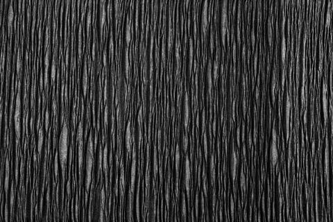 Crumpled black background Stock Photos