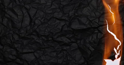 Crumpled Black Paper Igniting Stock Footage 170591116