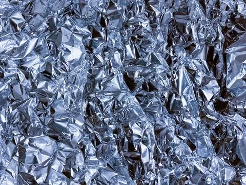 Crumpled blue foil texture. Stock-Fotos