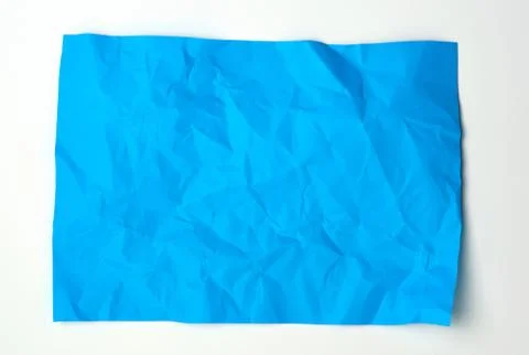 Crumpled blue rectangular sheet of paper 스톡 사진