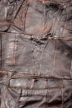 Crumpled brown leather patchwork Stock Photos