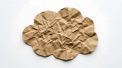 Crumpled brown paper cloud shape isolated on white background for creative .. Stock Photos