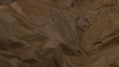 Crumpled brown paper Video stock 140311338