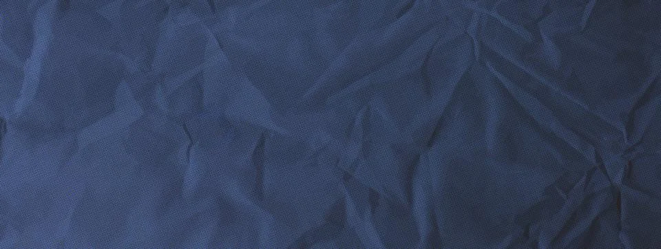 Crumpled deep blue paper texture. Kraft wrinkled grit cardboard texture. Navy Stock Illustration