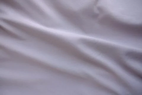 Crumpled fabric texture in cadet blue color Stock Photos