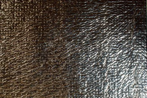 Crumpled foil with reflection for the background Stock Photos
