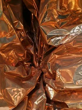 Crumpled foil texture abstract background for Easter packaging and festive desig Foto stock