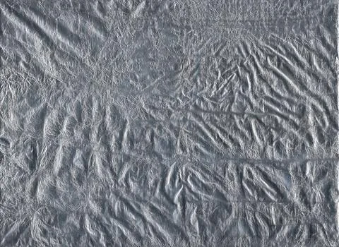 Crumpled foil texture Stock Photos