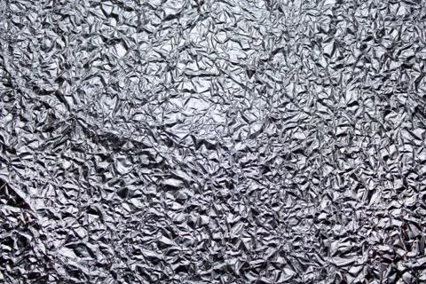 Crumpled foil texture Stock Photos