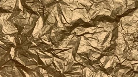 Crumpled Gold Paper Stock Footage 119338367