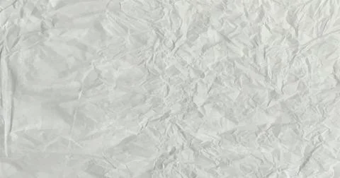 Crumpled grey paper texture. Abstract light blue background with wrinkled Stock Illustration