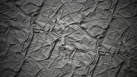 Crumpled grey paper texture background, with subtle light movement Video stock 341603684