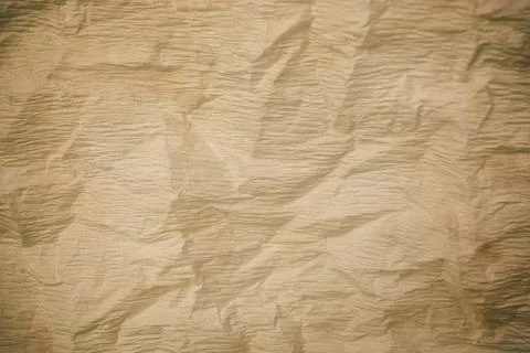 Crumpled old paper as background. Texture of parchment Photos
