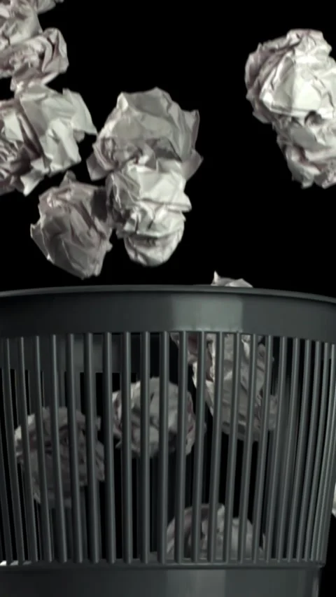 Crumpled paper falls into the trash can. Filmed on a high-speed camera at 1000 Stock Footage 335371532