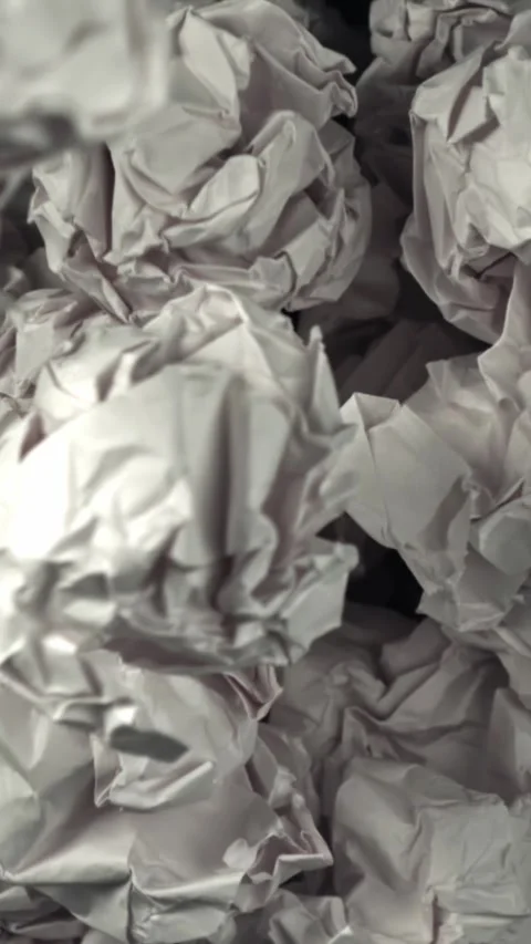 Crumpled paper falls into the trash can. Filmed on a high-speed camera at 1000 Stock Footage 335378003