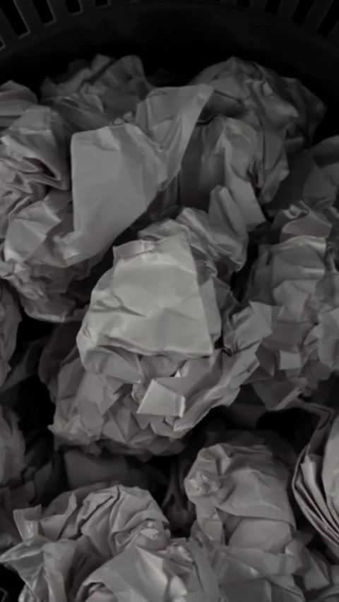 Crumpled paper falls into the trash can. Filmed on a high-speed camera at 1000 Stock Footage 335378797