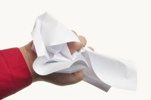 Crumpled paper in hand Stock Photos