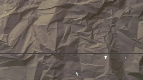 Crumpled paper texture with digital glitch line, animated background Video stock 333977499