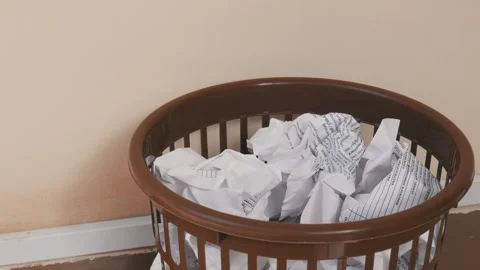 Crumpled paper is thrown in the trash Stock Footage 105795895