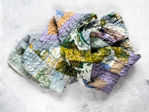 Crumpled patchwork scarf sewn from silk fabrics Stock-Fotos