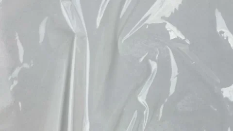 Crumpled plastic background plastic texture animation Stock Footage 252650040