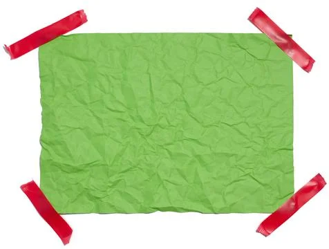 Crumpled rectangular sheet of green paper on a white background, top view. .. Stock Photos