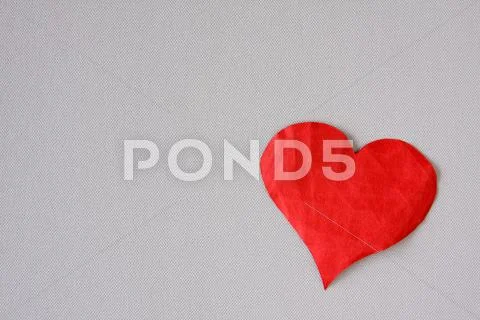 Crumpled red paper heart Stock Photos