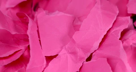 Crumpled red paper torn into strips in close-up, red paper torn into pieces Stock Footage 287674486