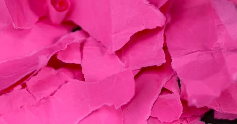Crumpled red paper torn into strips in close-up, red paper torn into pieces Stock Footage 290285685