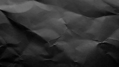 Crumpled rough dark surface. Seamless loop background. Stock Footage 253643138