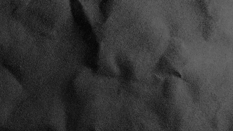 Crumpled rough dark surface. Seamless loop background. Stock Footage 253767519