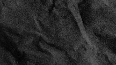 Crumpled rough dark surface. Seamless loop background. Stock Footage 255355912