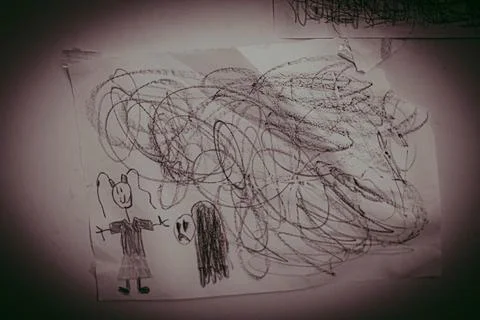 Crumpled sheet of paper with scribbles on it. Toned. Stock Photos