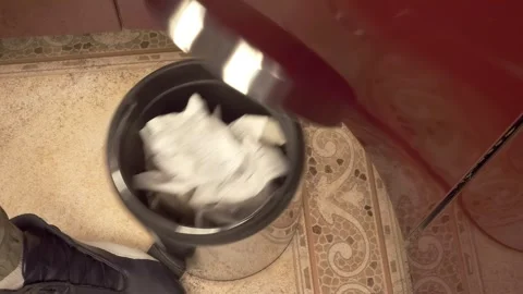 Crumpled sheet of paper that turned out to be unnecessary flies into a trash can Stock Footage 297793907