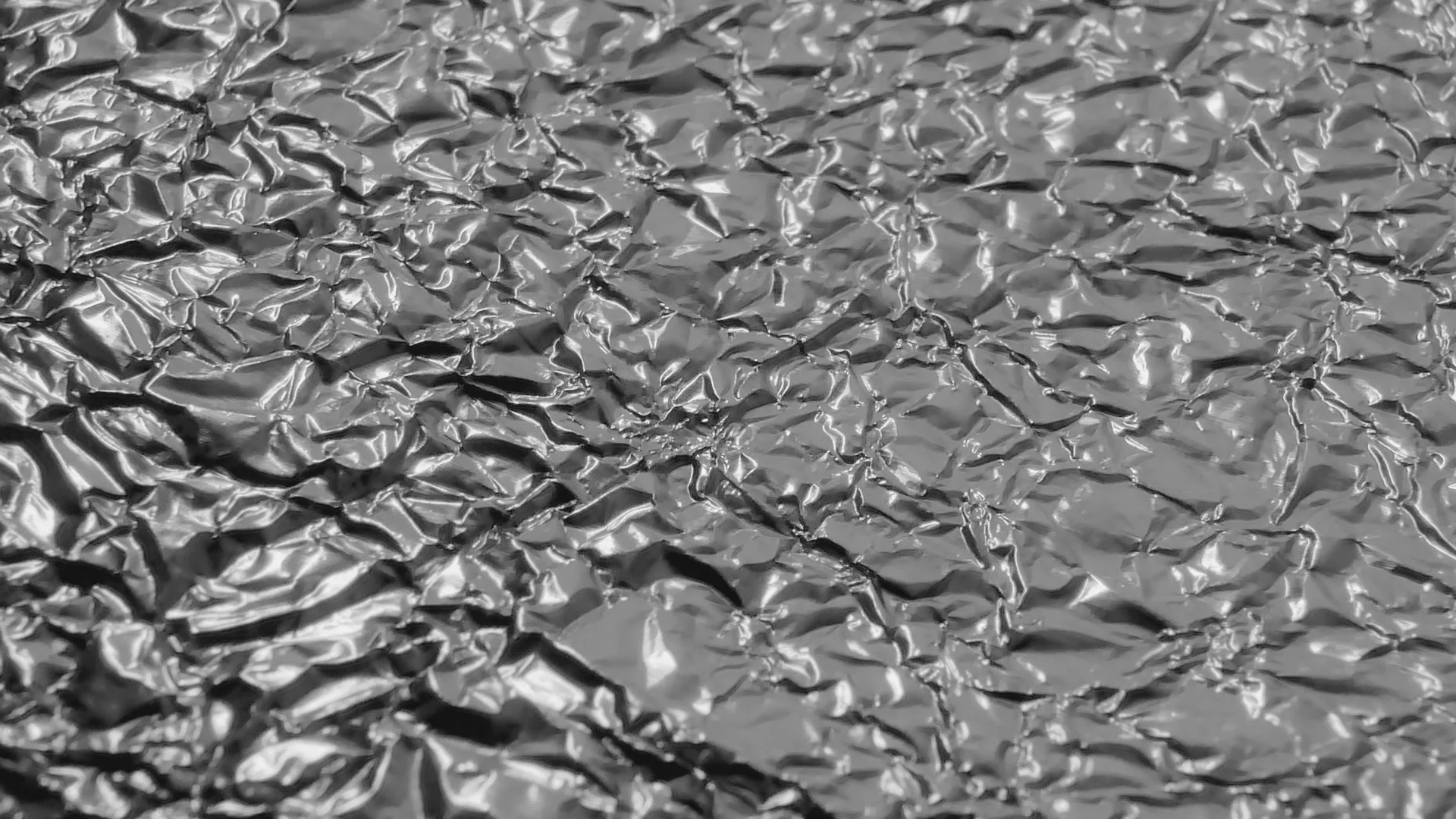 Crumpled sheet of thin metal. The surfac, Stock Video