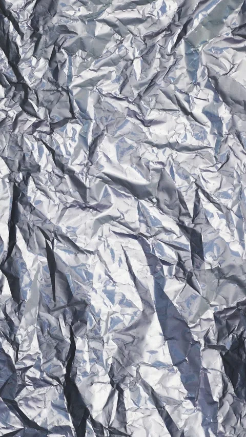 Crumpled Silver Foil Texture Background with Shiny Metallic Surface Stock Footage 311501783