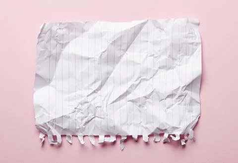 Crumpled Torn Lined Paper Sheet on Pink Background Texture Stock Photos