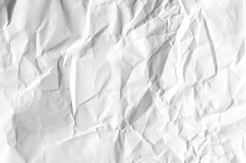 Crumpled white blank sheet as texture or background Stock-Fotos