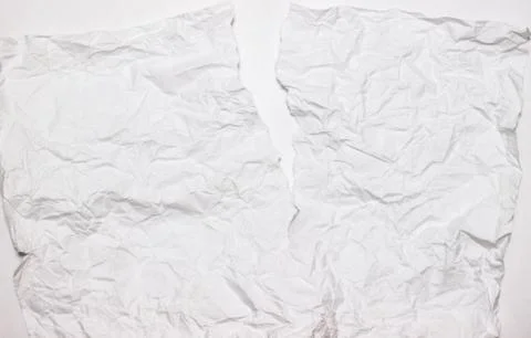 Crumpled white paper. White wrinkled texture. Stock Photos