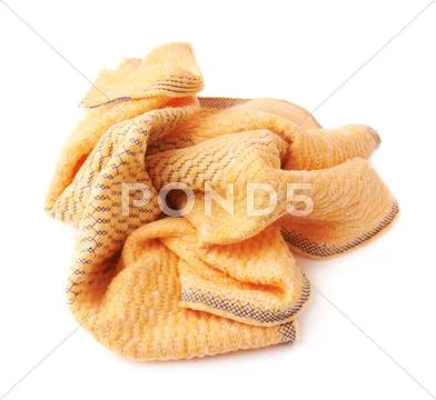 Crumpled yellow towel isolated over the white background Stock Photos