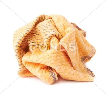 Crumpled yellow towel isolated over the white background Stock Photos