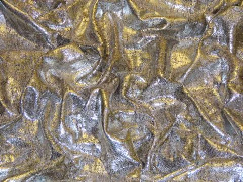 Crunched bronze textile Stock Photos