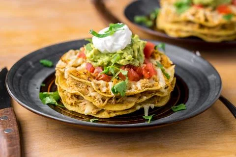 Crunchy chicken tostada stack. Stock Photos