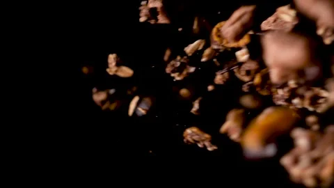 Crunchy cornflakes falling into dark background on the right side. Stock Footage 153600151