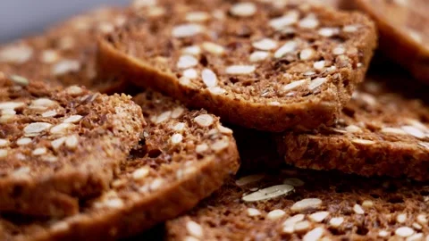 Crunchy dark rye bread rusks. Rotation Stock Footage 334055576