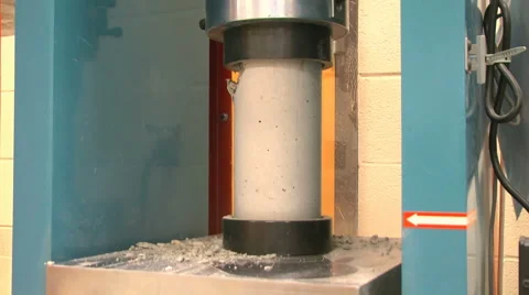 Crush Testing a Concrete Cylinder in a Compression Machine Video stock 43553677