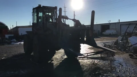 Crushed Car Picked Up by Forklift Stockbeeldmateriaal 101201265